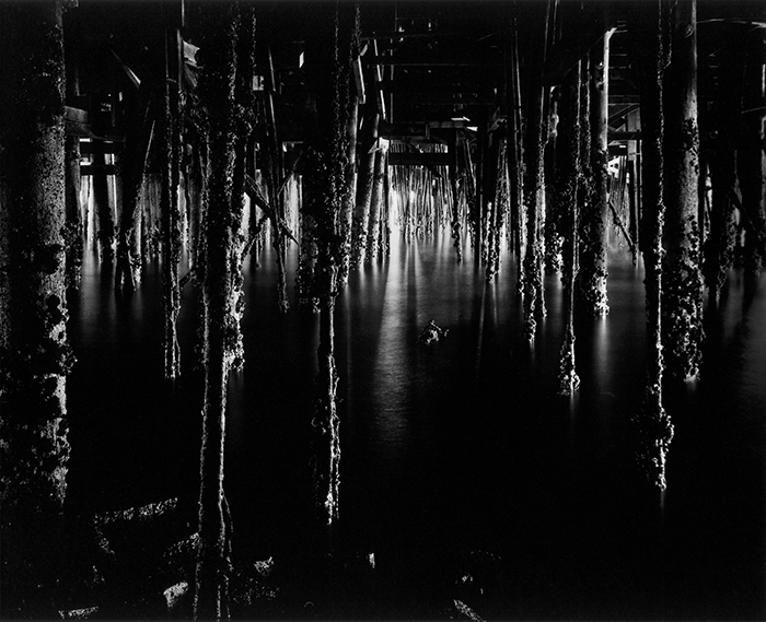 Wynn Bullock - Under Monterey Wharf, 1969